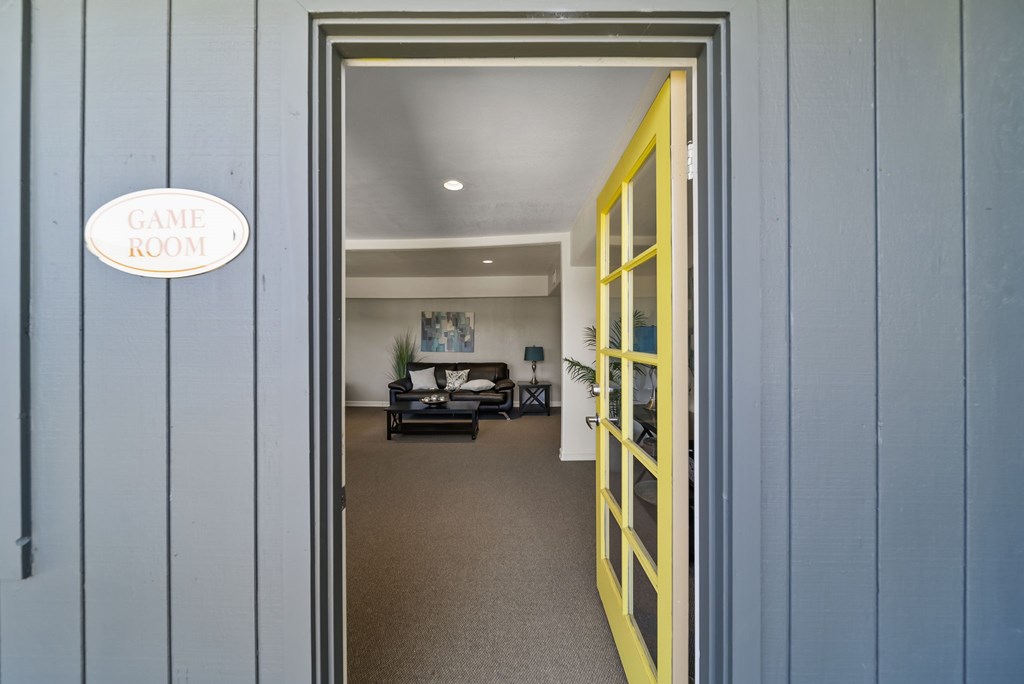 A room with a sign that says Game Room.