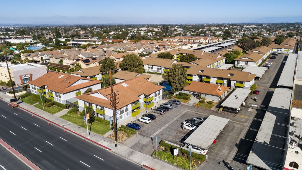 A residential area with houses and a road.