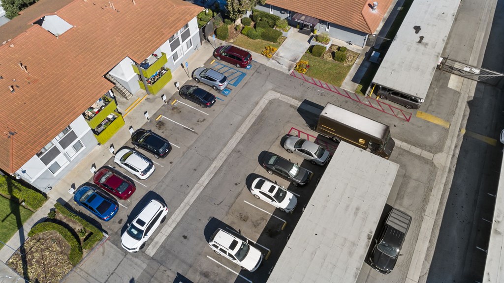 A parking lot with cars parked in it.