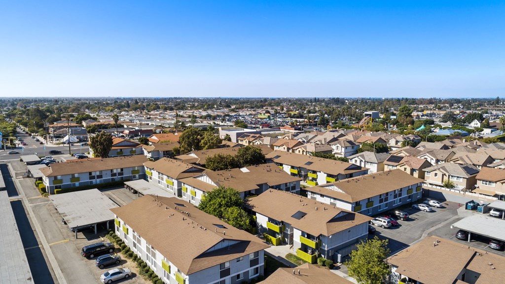 A view of a residential area with houses and buildings.