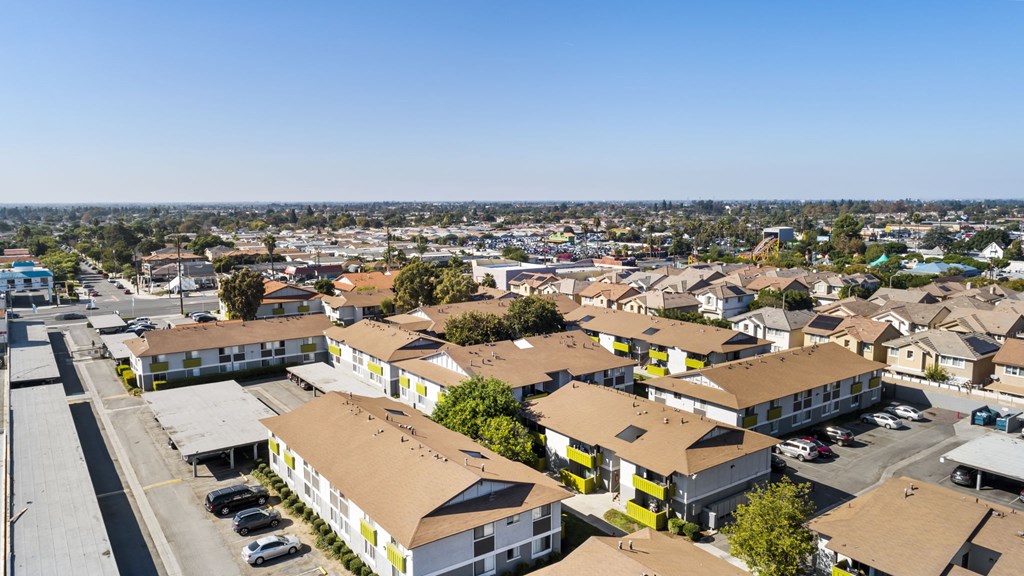 A view of a residential area with houses and buildings.