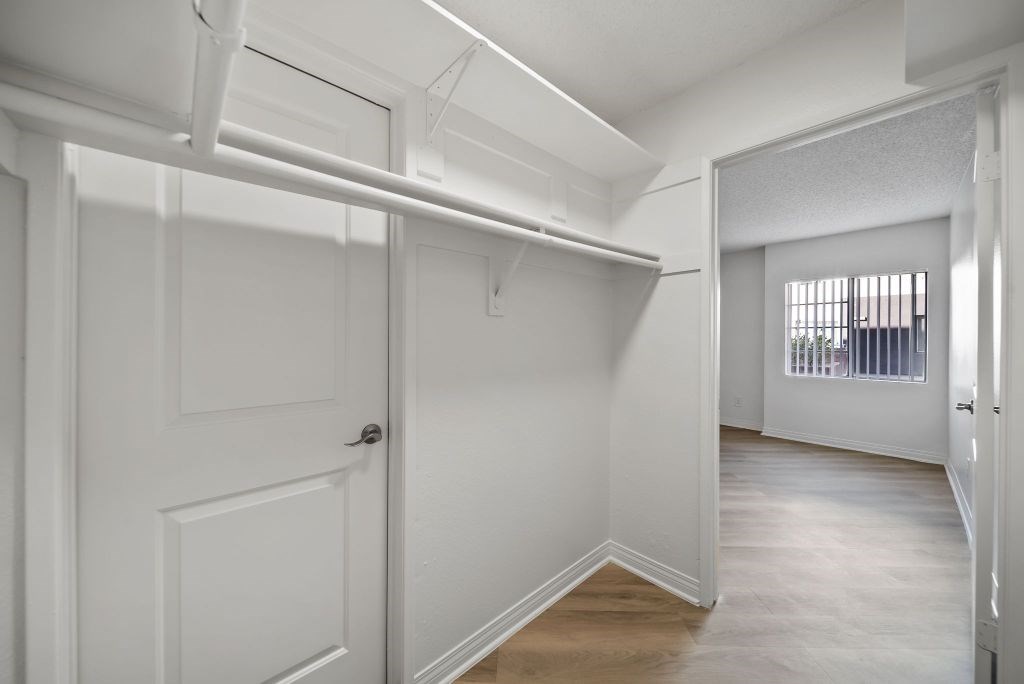 A white door is on the left side of the image.