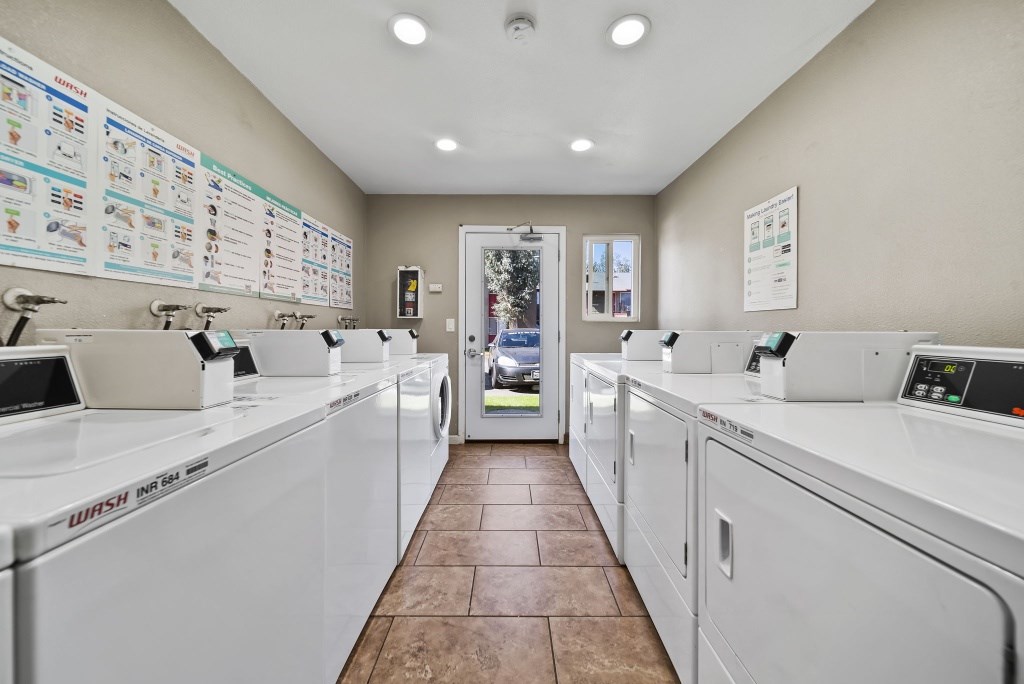 A laundromat with Wash Wash Wash 240 machines.