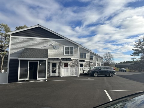 a building with a car parked in front of it