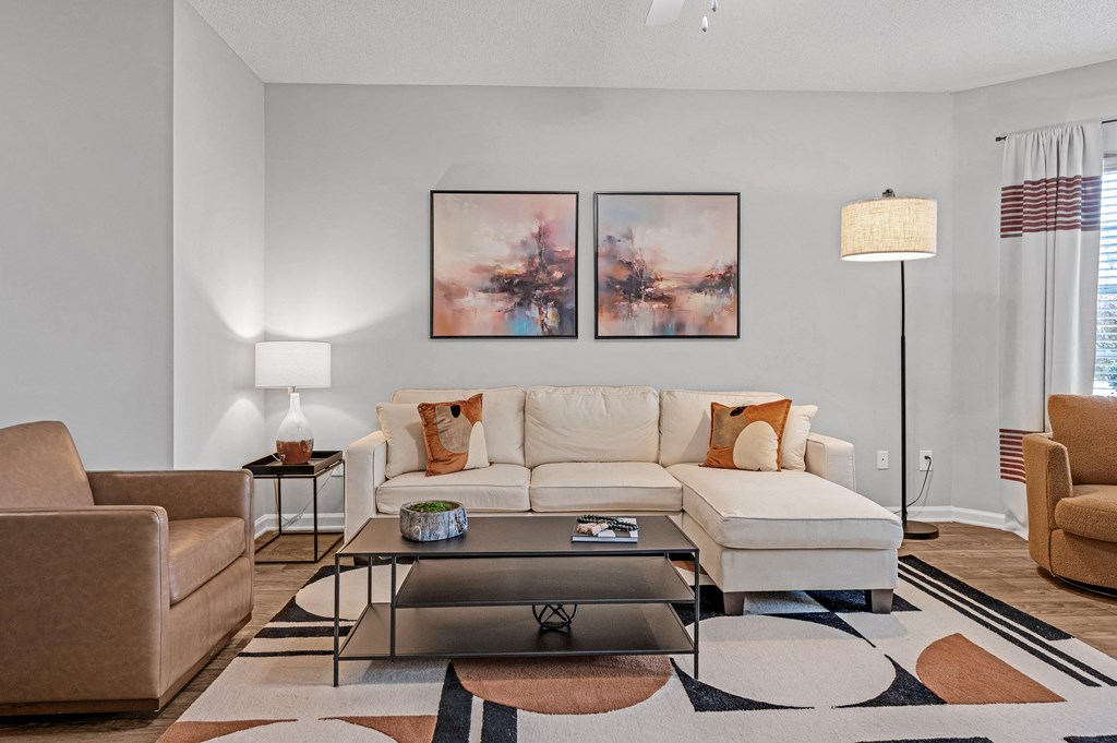 Living room with a couch and two couches  at Harrison Grande, North Carolina