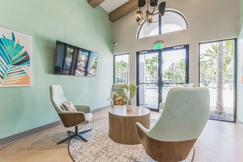 the preserve at ballantyne commons living room with chairs and a table