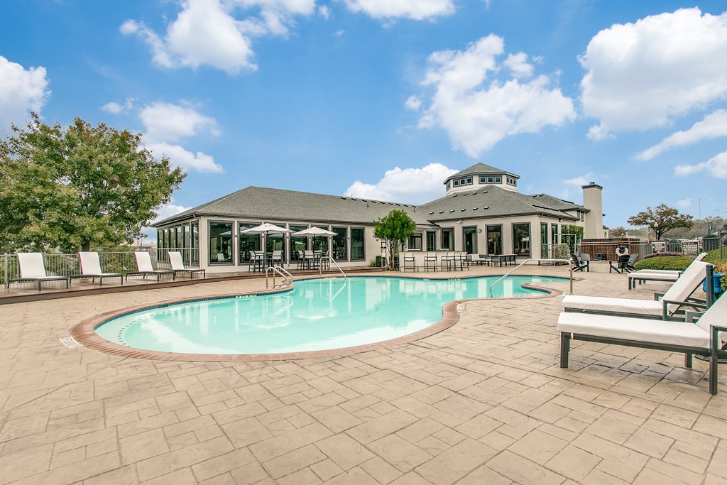Sparkling Pool with Sundeck Sparkling Pool with Sundeck at The Atlantic Stone Oak Apartments, San Antonio Texas