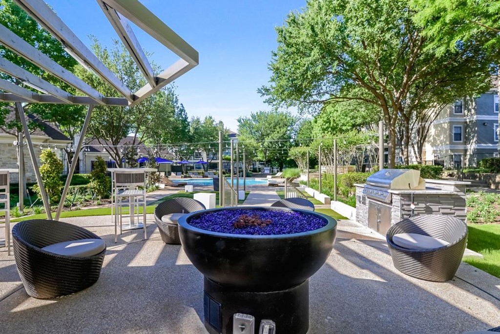 Outdoor Entertaining Space with Cozy Fireside Feature. at Franciscan of Arlington, Arlington, 76015