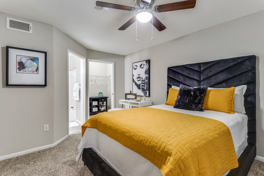 Bedroom with cozy bed Bedroom with cozy bed at The Atlantic Grand Oaks, Austin