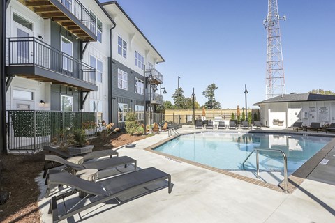 Pool with lounge area at Arcadia Decatur, Decatur, GA