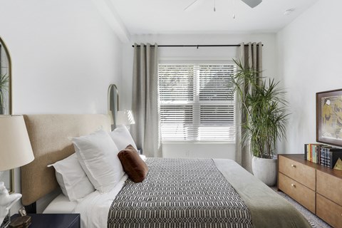 Master bedroom with a king size bed at Arcadia Decatur, Decatur, Georgia, 30030.