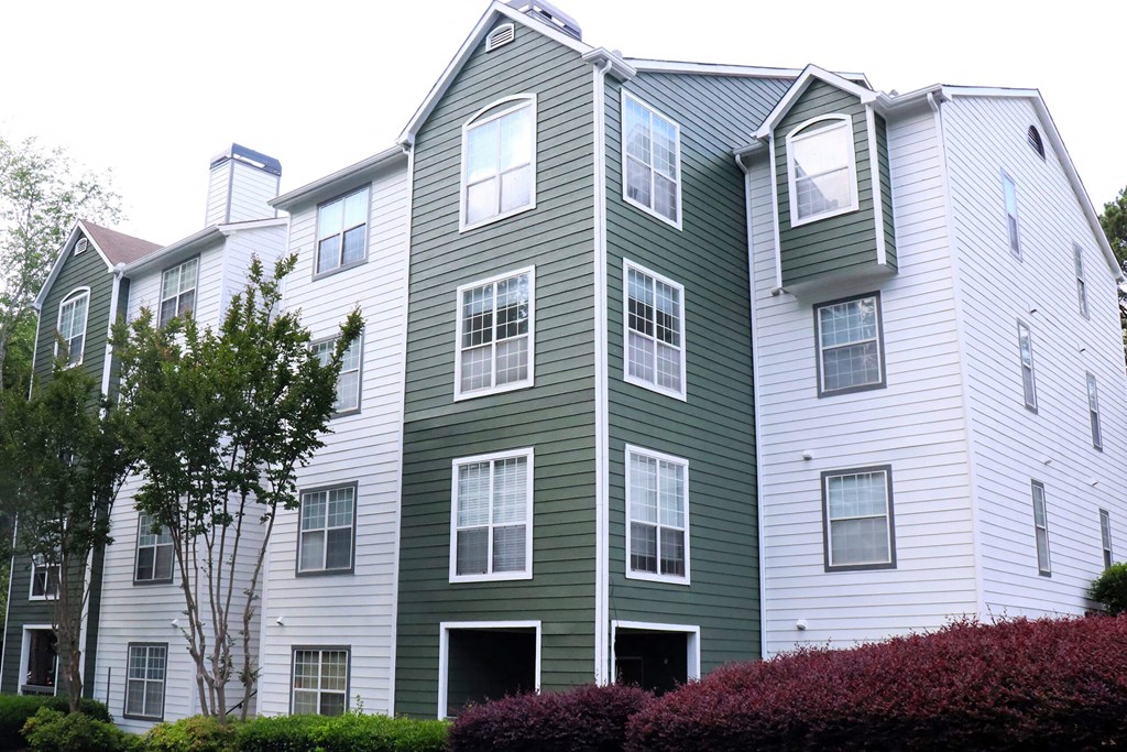 Green and white apartment building  at Sloan Square, Atlanta, Georgia.