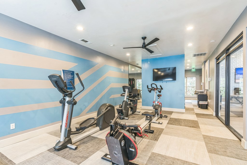A gym with exercise equipment at The Atlantic Loring Heights, Atlanta, Georgia