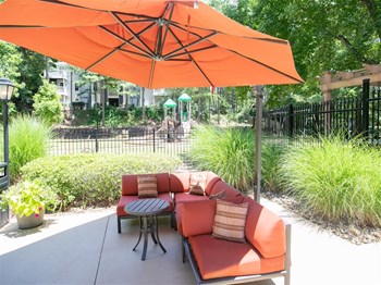 furnished lounge area by pool