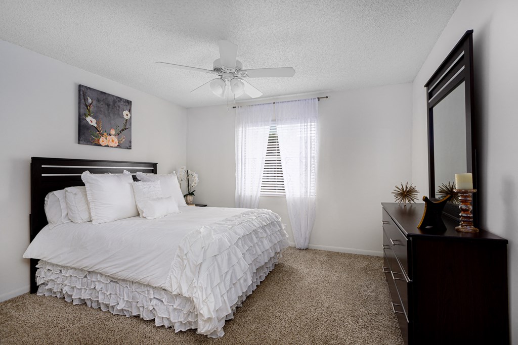 Bedroom with bed and dresser displayed. Bedroom with bed and dresser displayed. at Palms of Boca Del Mar, Florida, 33433