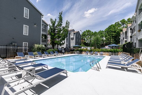 Sparkling Lap Pool with lounges at Sloan Square, Atlanta, GA, 30329.