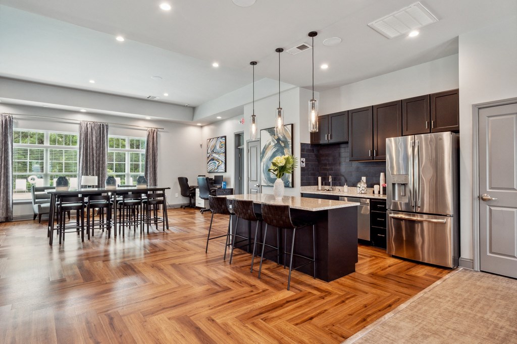Kitchen with stainless steel appliances and a wooden floor at The Atlantic Mountain Island, Charlotte