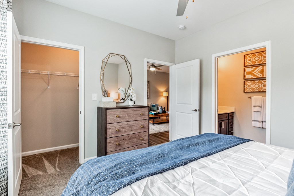 Bedroom with a bed and a closet at The Atlantic Mountain Island, Charlotte, NC