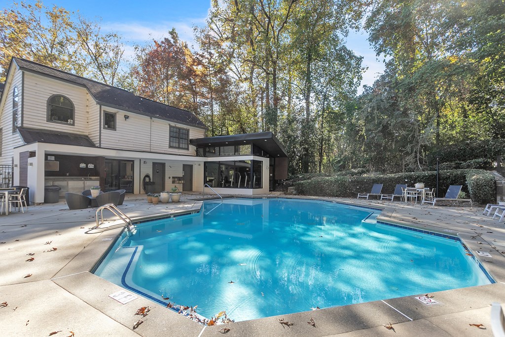 Swimming pool in the backyard of a house with a pool at The Atlantic Briarcliff, Georgia, 30329