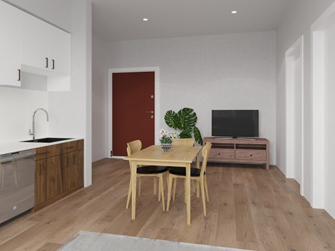 A modern dining room with a wooden table and chairs.