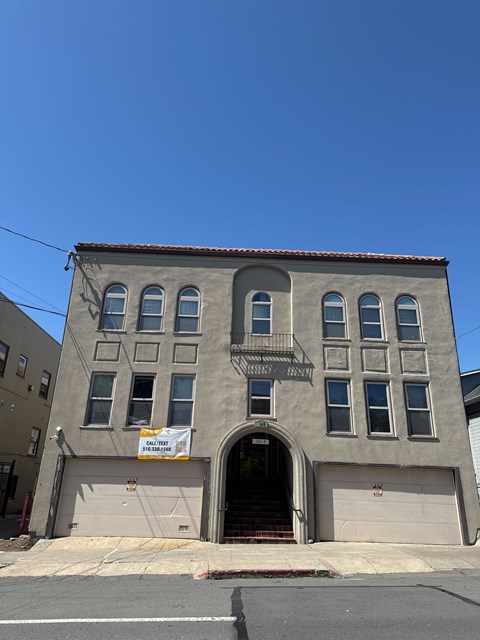 A building with a sign that says "SOLD" on it.
