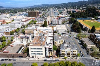 an aerial view of a city with many buildings