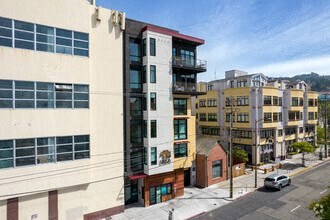 a large building with a car parked in front of it