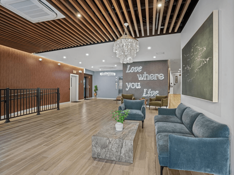 the lobby or reception area of love where you lie apartments
