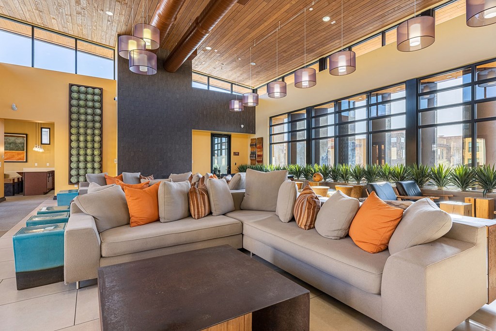 a living room with couches and a coffee table