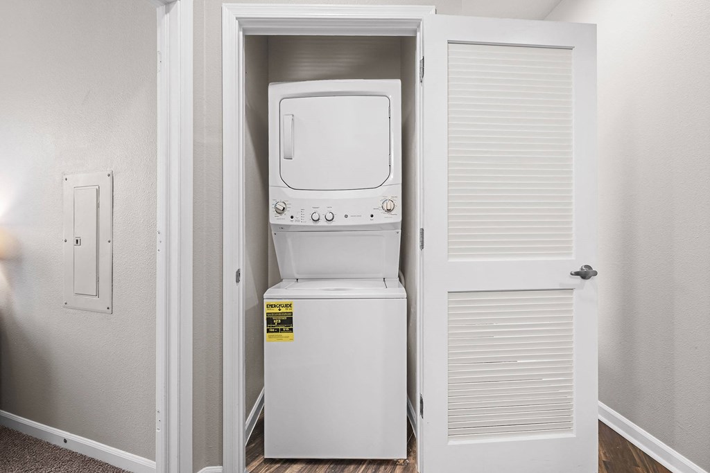 a small laundry room with a washer and dryer in it