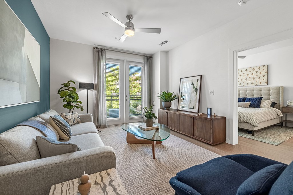 a living room with a couch and a table
