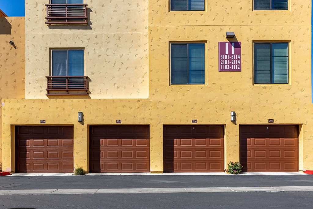 a building with brown garage doors on it