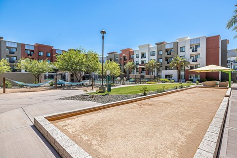 the preserve at ballantyne commons courtyard with playground and apartment buildings