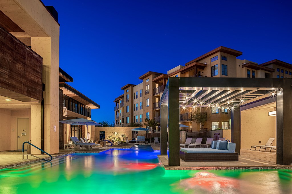 a swimming pool at the resort at night