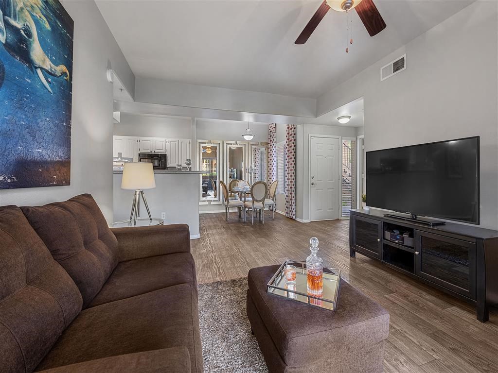 a living room with a couch and a tv