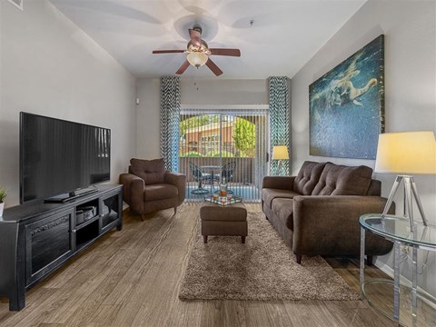 a living room with a couch and a tv