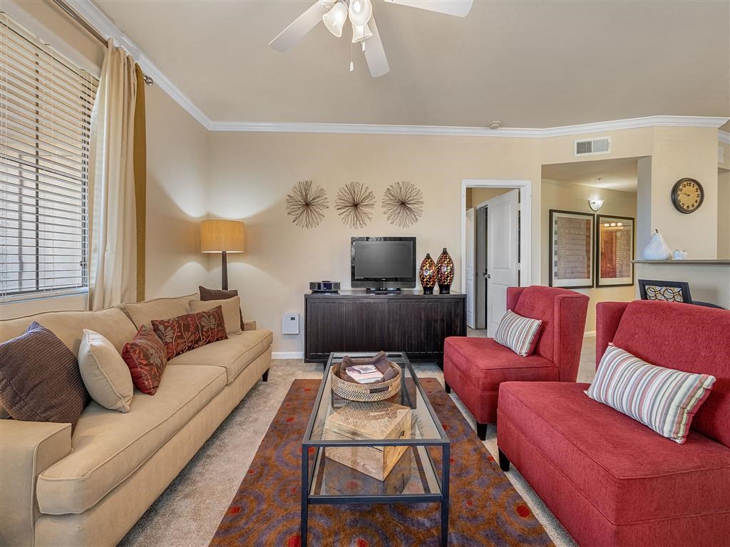 a living room with two couches and a television