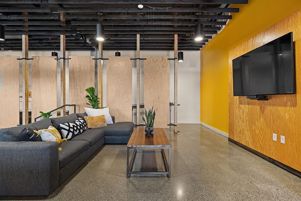 a living room with a couch and a coffee table