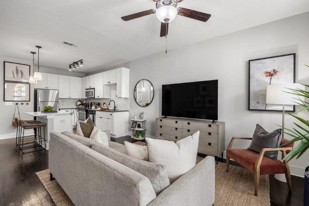 a living room with a couch and a tv