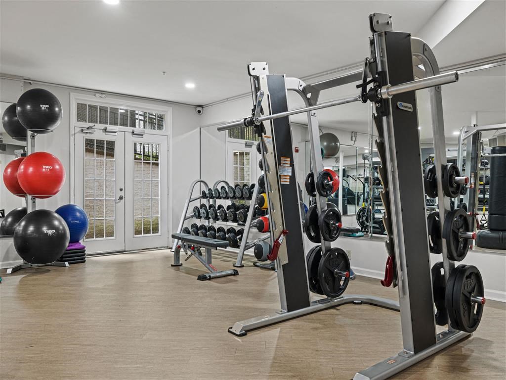 the gym is stocked with weights and cardio equipment