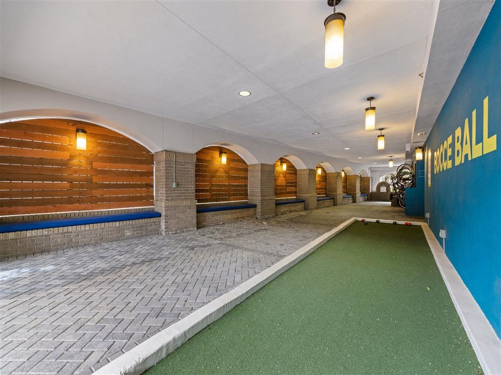 a game room with a mini pool