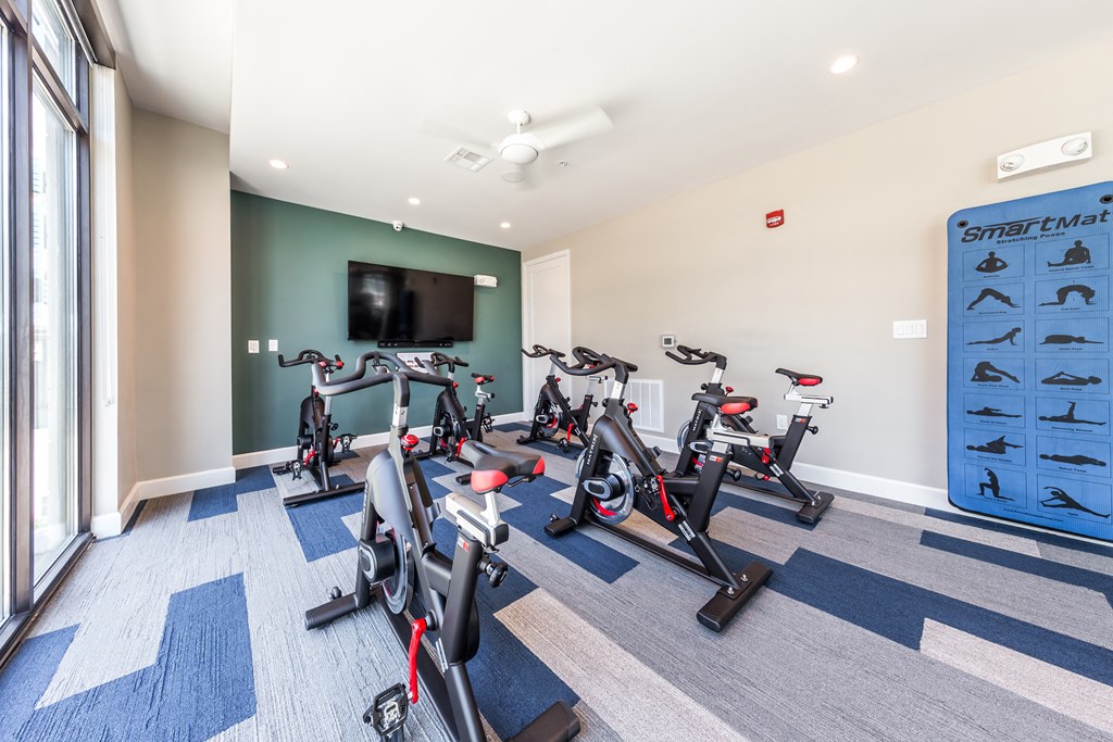 the gym at the flats at big tex apartments