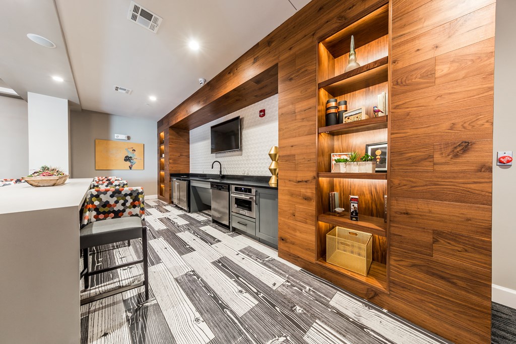 a kitchen with stainless steel appliances and a counter top