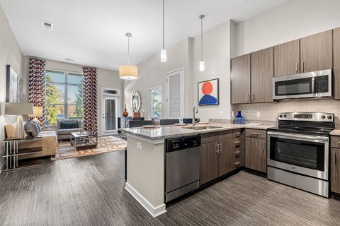 a kitchen with stainless steel appliances and a counter top