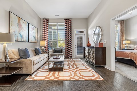 a living room with a couch and a table