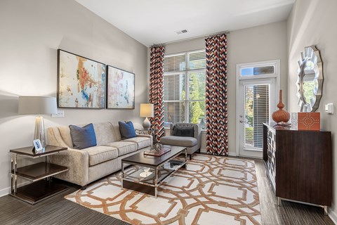 a living room with a couch and a table