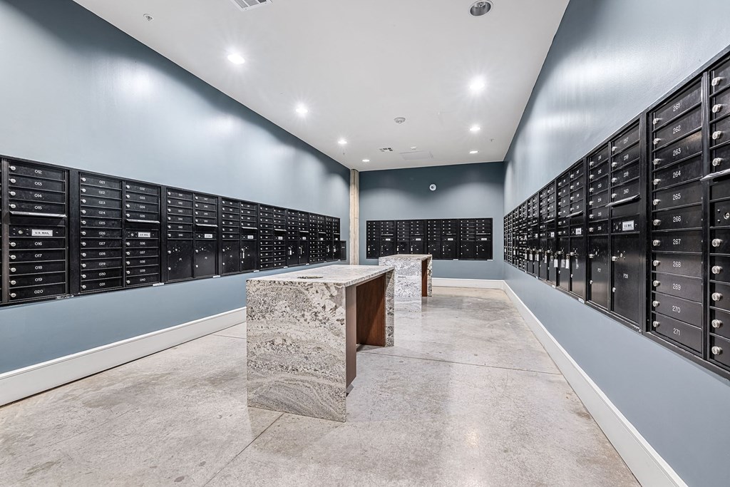 a large wine cellar with many racks of wine bottles and tables