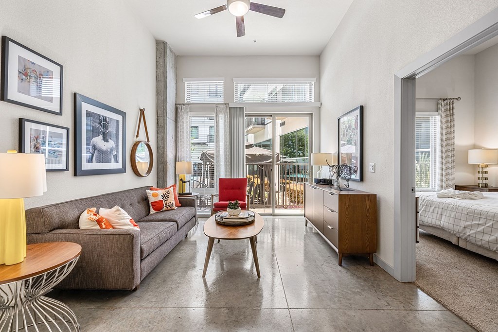 a living room with a couch and a table