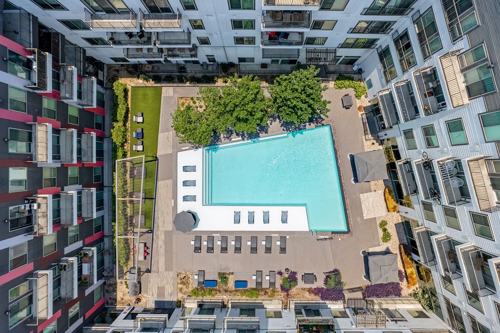 an overhead view of a pool in the middle of a building