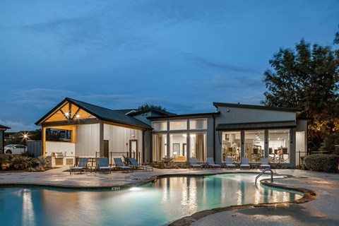 a home with a swimming pool and patio